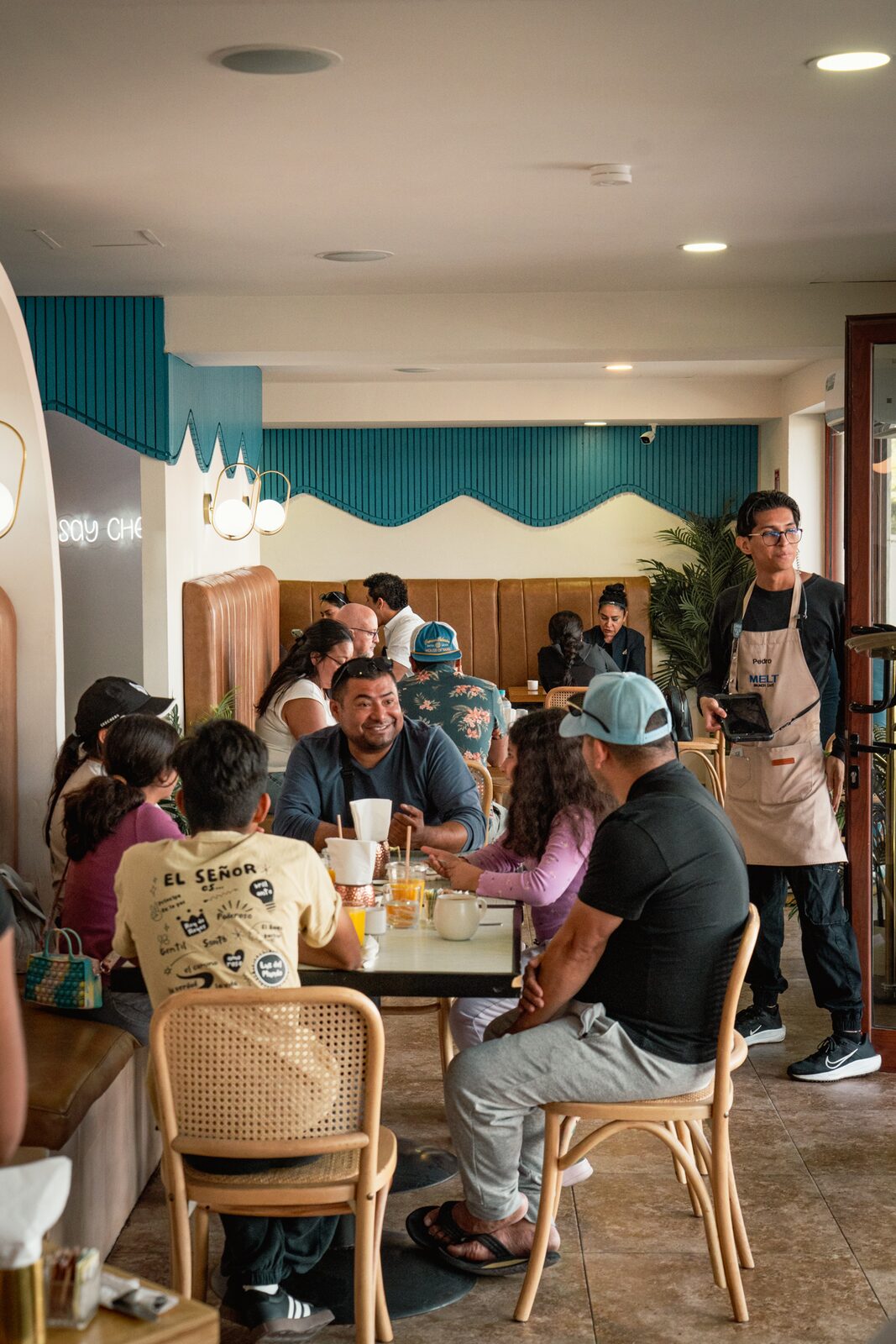 Melt dining room with guests and staff